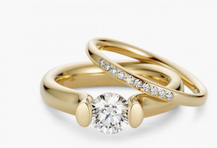 Aanzoeksring aanschuifring gouden ring trouwring diamant briljant geelgoud satelite ringwitgoud 