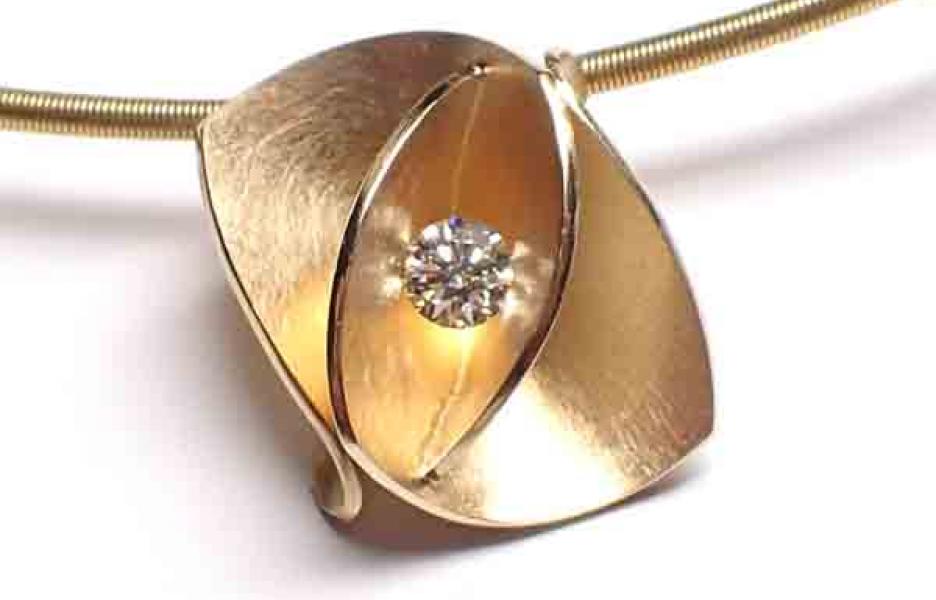 Snier niessing met hanger Cardillac geelgoud diamant