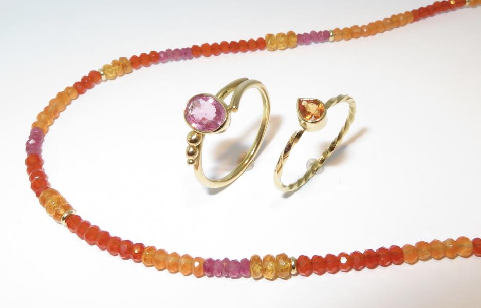 Gouden ring met Rose Saffier, oranje Saffier en edelsteencollier robijn, mandarijngranaat, carneool geelgoud
